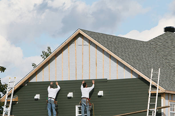 Professional Siding technician working in Starford, PA